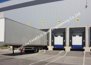 China PVC Fabric Loading Dock Sectional Seal Lifting Industrial Garage Doors With Remote Operations on sale